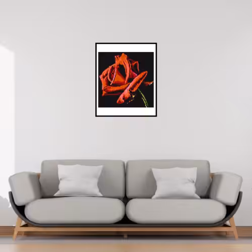 Tableau rose en pixel art accroché à un mur